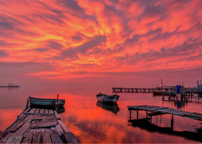 Pier Greeting Card featuring the photograph A burning sky over an old pier by Alexios Ntounas
