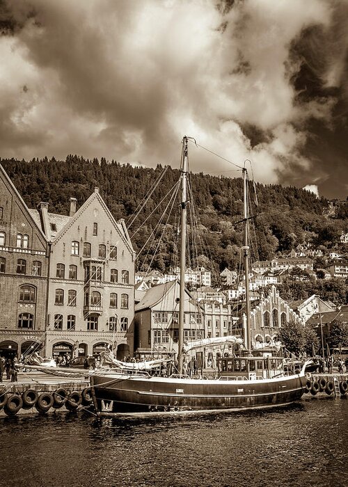 Town Greeting Card featuring the photograph A ship at Bryggen Wharf in Bergen by W Chris Fooshee