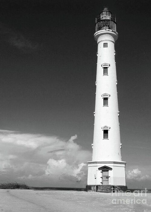 Lighthouse; California Lighthouse; Aruba; Blue; Beach; Rocks; Rock; Clouds; Cloud; Beach; Windows; Sky; Building; Remote; Black And White; Greeting Card featuring the photograph Aruba California Light BW by Tina Uihlein