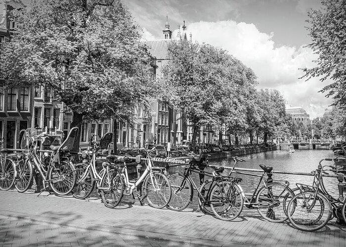 Amsterdam Greeting Card featuring the photograph Bicycles Along the Canals in Black and White by Debra and Dave Vanderlaan