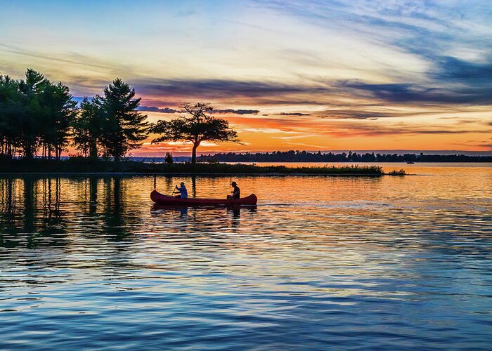 Higgins Lake Greeting Card featuring the photograph Canoe at Sunset by Joe Holley