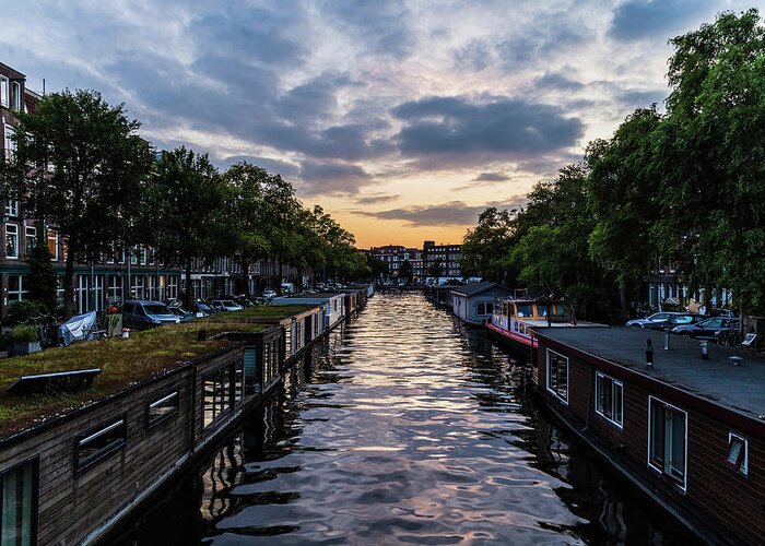 City Greeting Card featuring the photograph City canal at sunset in Amsterdam by Fabiano Di Paolo