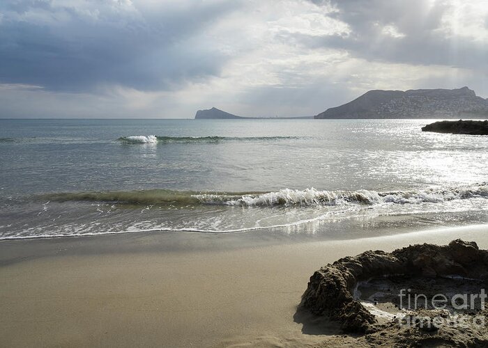Sandy Beach Greeting Card featuring the photograph Clouds, light and view of the Mediterranean Sea by Adriana Mueller