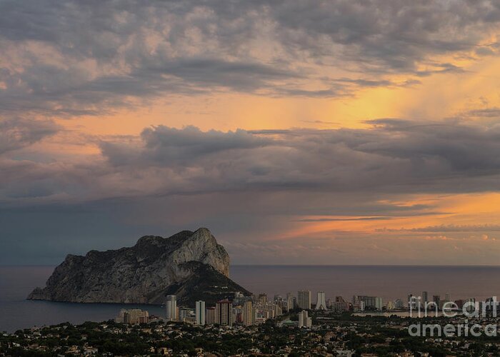Sunset Greeting Card featuring the photograph Clouds on the Mediterranean coast in Calpe by Adriana Mueller