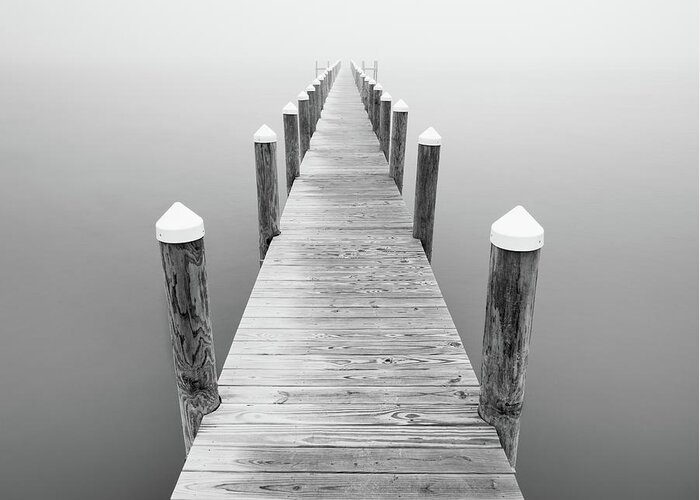 Black And White Greeting Card featuring the photograph Pier Into The Unkown by Jordan Hill