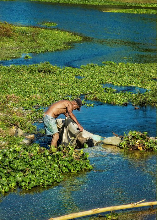 Cuba Greeting Card featuring the photograph Do the laundry in the Bayamo river by Micah Offman