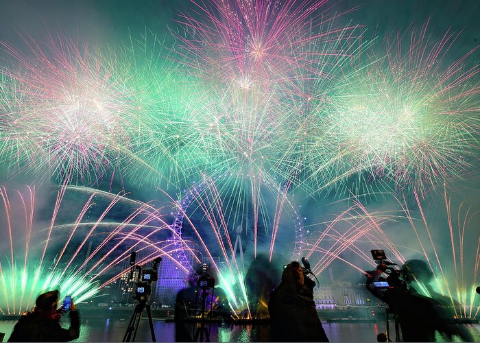 Fireworks Greeting Card featuring the photograph Fireworks at New years Eve by Andrew Lalchan