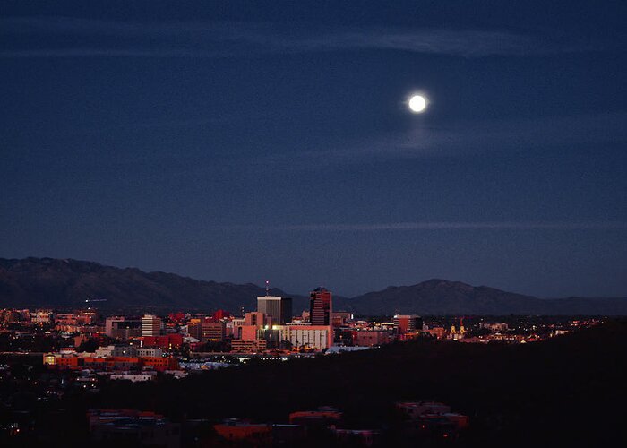 Tucson Greeting Card featuring the photograph Full moon rises over downtown Tucson, Arizona by Chance Kafka