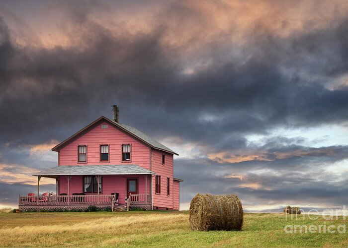 Typical Greeting Card featuring the photograph rchitecture of the Magdalen Islands, where all the wooden houses are brightly painted. Sunset shot of a house on the hill. Image taken from a public position. by Jane Rix