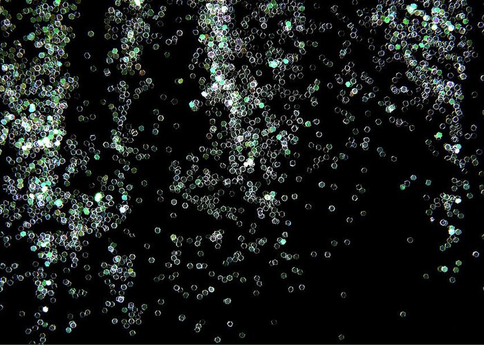 Background Greeting Card featuring the photograph Glitter Sparkle On Black Background by Severija Kirilovaite