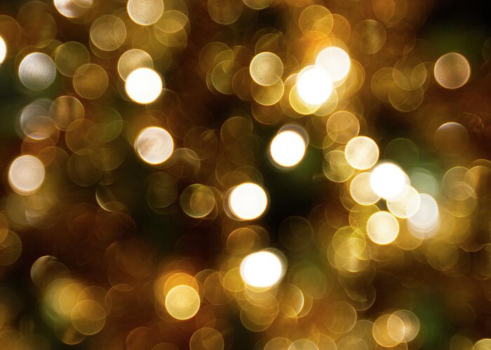 Abstract Greeting Card featuring the photograph Gold bokeh effect by Karen Foley