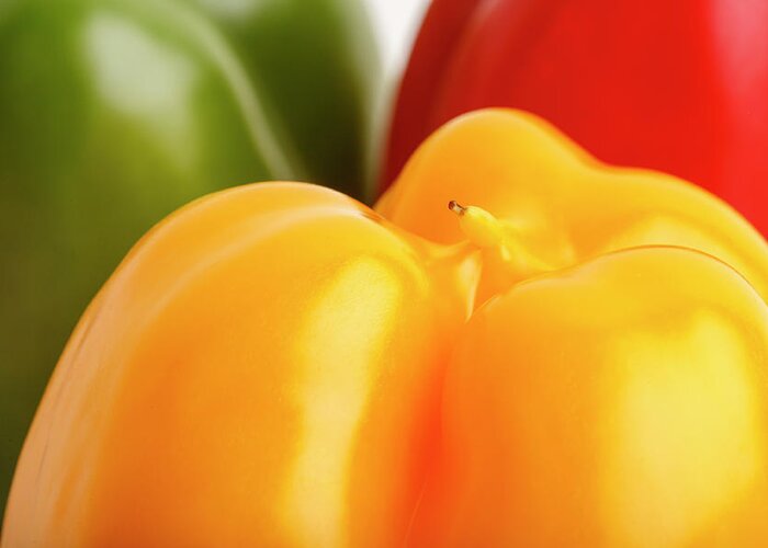 Agriculture Greeting Card featuring the photograph Green Red and Yellow Bell Peppers Closeup by Todd Bannor