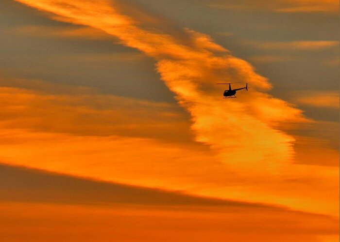 Helicopter Greeting Card featuring the photograph Helicopter Approaching at Sunset by Linda Stern