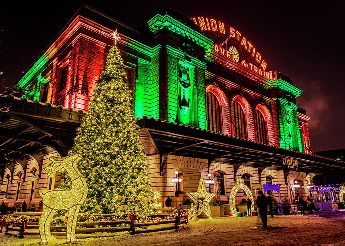 Christmas Greeting Card featuring the photograph Holiday lighting of Denver Union Station by Teri Virbickis