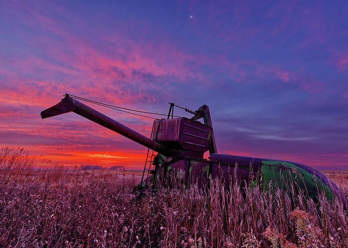 John Deere Greeting Card featuring the photograph Hoping for Another Harvest - vintage John Deere combine before a ND sunrise by Peter Herman