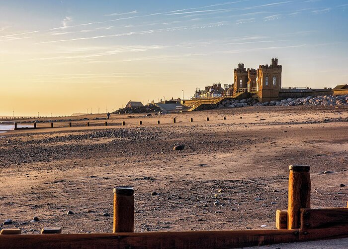 Withernsea Beach Greeting Card featuring the photograph Lone dog walker on Withernsea Beach by Tim Hill