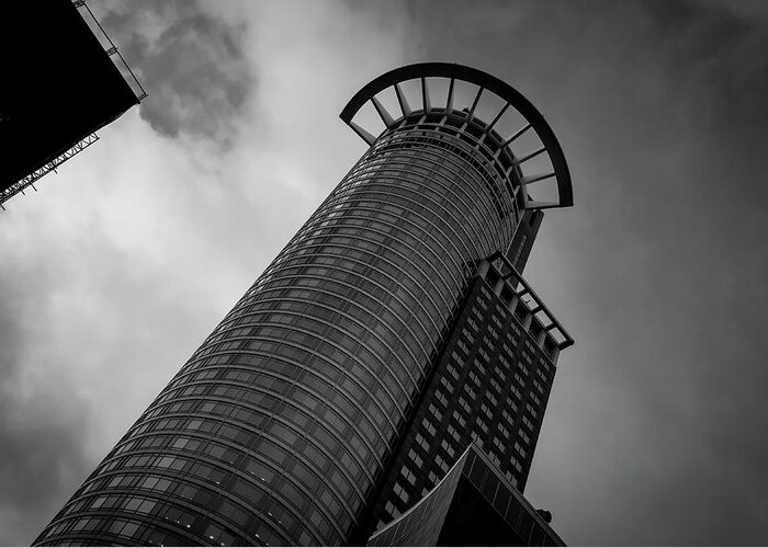 Office Building Greeting Card featuring the photograph Modern architecture design of a Skyscraper building. Black and white futuristic exterior against cloudy sky by Michalakis Ppalis