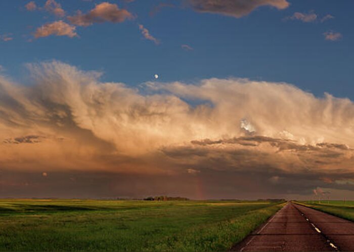 Storm Greeting Card featuring the photograph ND Showing off #2 - panorama of massive stormcloud above ND hwy 281 at sunset with moon by Peter Herman
