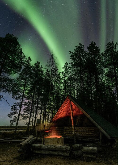 Aurora Borealis Greeting Card featuring the photograph Northern lights above a fire place by Thomas Kast