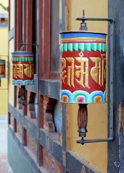 Bhutan Greeting Card featuring the photograph Prayer wheels repeating mantra Om mani padme um by Steve Estvanik