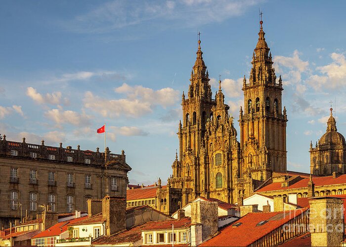 Way Greeting Card featuring the photograph Santiago de Compostela Cathedral Towers Close Up with Sun Light Hitting the facade and Tiled Roofs La Corua Galicia by Pablo Avanzini