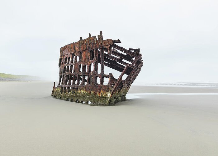 Beach Greeting Card featuring the photograph Shipwreck hugged by fog by Rudy Wilms
