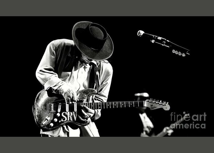 Stevie Ray Vaughan Greeting Card featuring the photograph Stevie Ray Vaughan in concert by Action