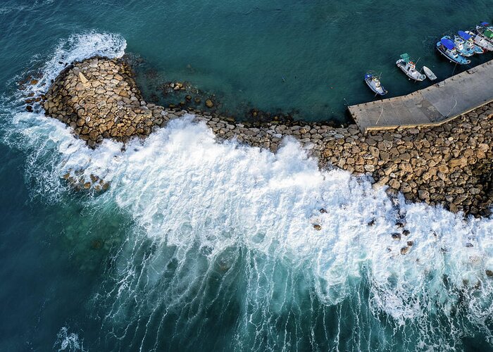 Brakewater Greeting Card featuring the photograph Stormy windy waves on the shore. Drone photography. by Michalakis Ppalis