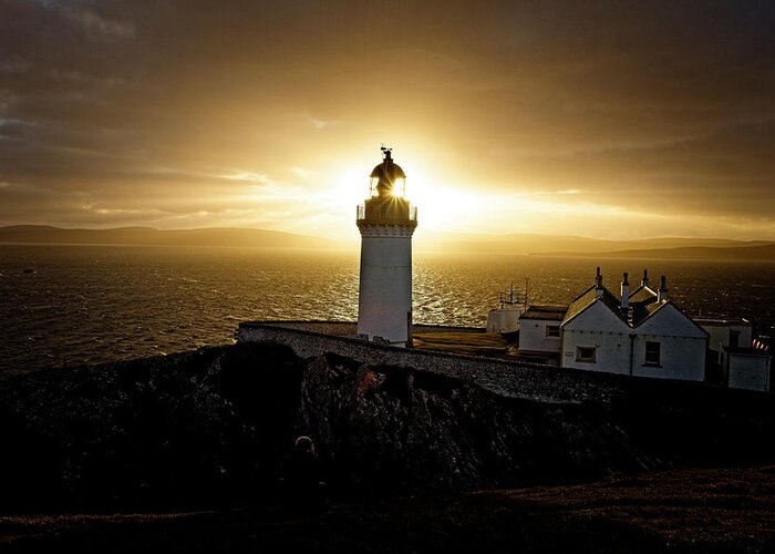 Biblical Light Greeting Card featuring the photograph Sun setting over Bressay Lighthouse by Tony Mills