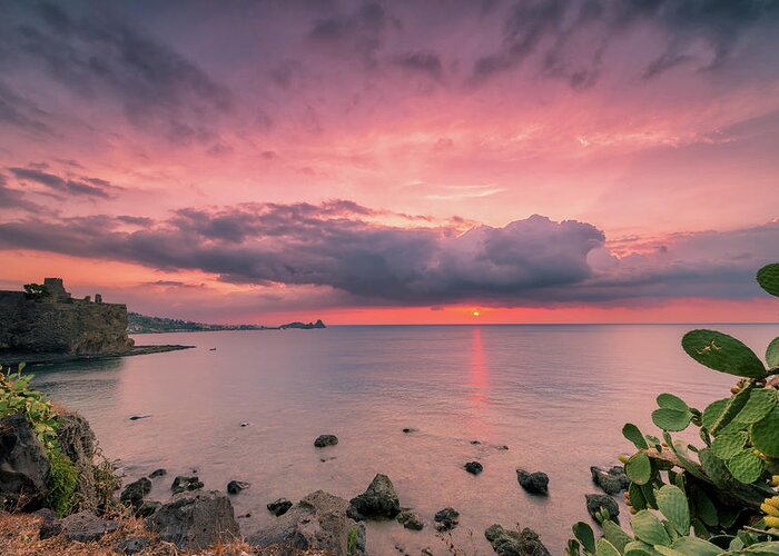 Acicastello Greeting Card featuring the photograph Sunrise over the Sicilian sea by Mirko Chessari
