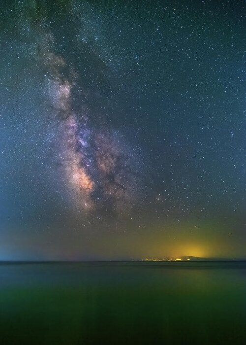 Milky Way Greeting Card featuring the photograph The Milky Way Over The Sea by Alexios Ntounas
