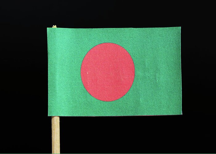  Bangladesh Greeting Card featuring the photograph The national flag of Bangladesh on toothpick on black background. A red disc on a green field by Vaclav Sonnek