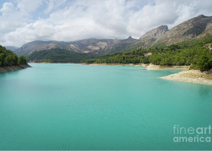 Guadalest Greeting Card featuring the photograph Turquoise blue water and mountain landscape by Adriana Mueller