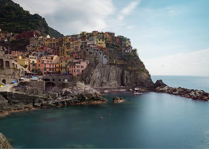 Cinque Terre Greeting Card featuring the photograph Village of Manarola with colourful houses at the edge of the cliff Riomaggiore, Cinque Terre, Liguria, Italy by Michalakis Ppalis