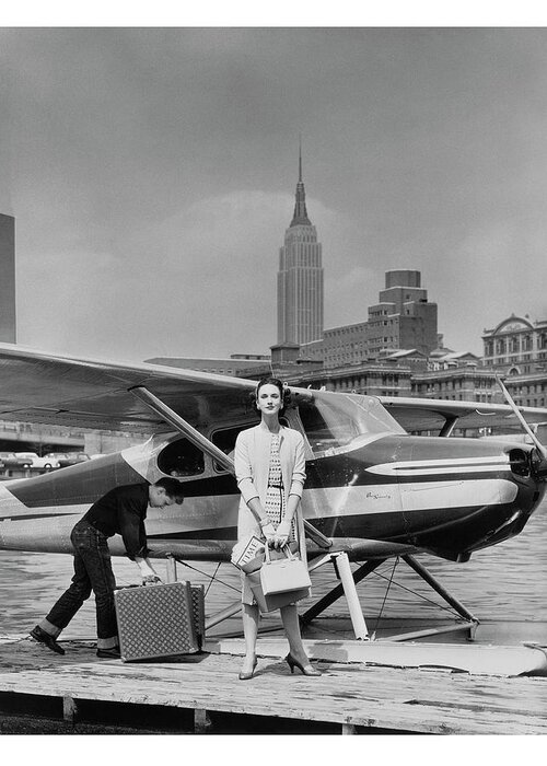 Accessories Greeting Card featuring the photograph Woman by a Seaplane by John Rawlings