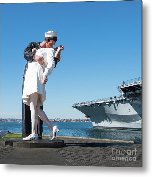 Embracing Peace Sculpture Metal Print featuring the photograph Embracing Peace Sculpture and USS Midway Aircraft Carrier by David Levin