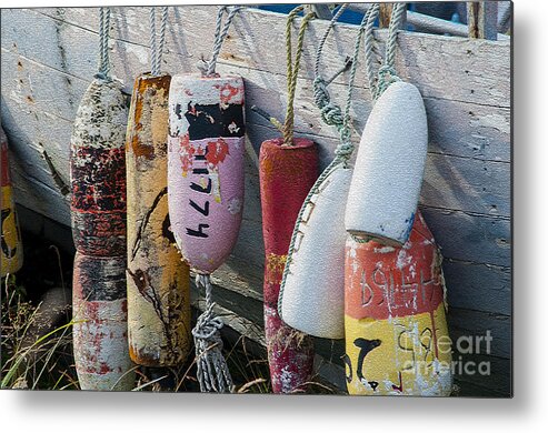 Buoys Metal Print featuring the photograph Buoys hanging on boat #1 by Dan Friend