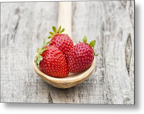 Berry Metal Print featuring the photograph Strawberries in a wooden spoon #1 by Paulo Goncalves