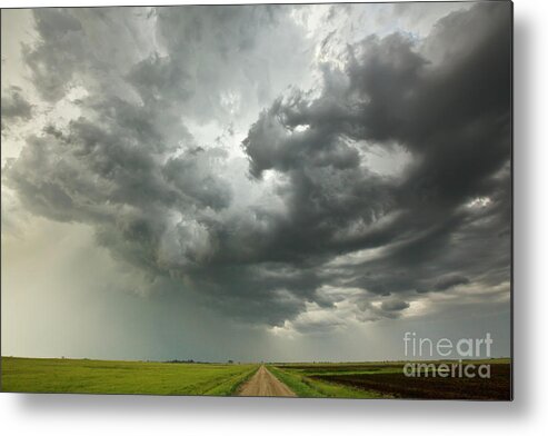 00559187 Metal Print featuring the photograph Sunset Storm Clouds Billowing by Yva Momatiuk John Eastcott