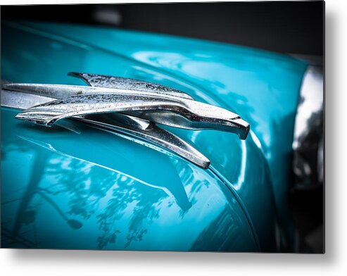 1953 Ford Bel Aire Metal Print featuring the photograph '53 Ford Bel Air Hood Ornament 2 #53 by Ronda Broatch