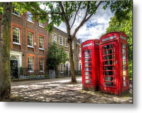 Europe Metal Print featuring the photograph A Pair of Red Phone Booths by Tim Stanley