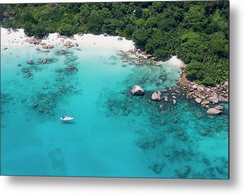 Sailboat Metal Print featuring the photograph Aerial Of Sailboat Off Anse Lazio by Holger Leue