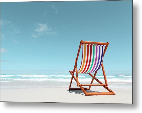 Tranquility Metal Print featuring the photograph Beach Chair With Rainbow Stripes by John White Photos