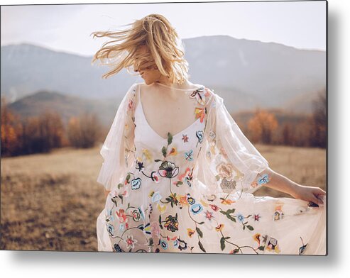Youth Culture Metal Print featuring the photograph Beautiful hippie woman dancing in a meadow by South_agency