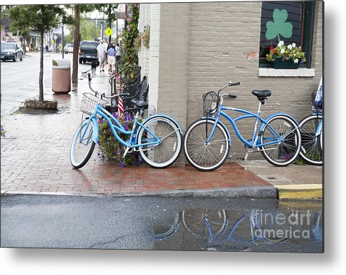 Bicycles Metal Print featuring the photograph Bicycles parked along the main street in Saint Michaels Maryland. by William Kuta