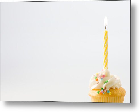 White Background Metal Print featuring the photograph Birthday candle on a cup cake by Image Source