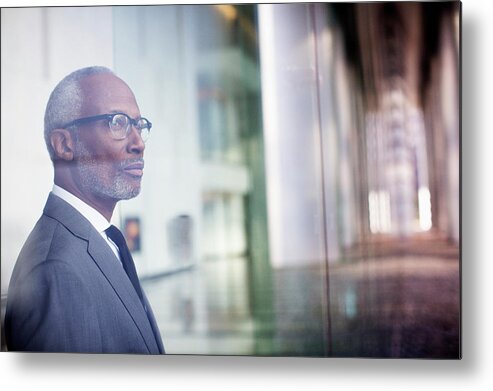 Corporate Business Metal Print featuring the photograph Black Businessman Looking Out Window by Hill Street Studios Llc
