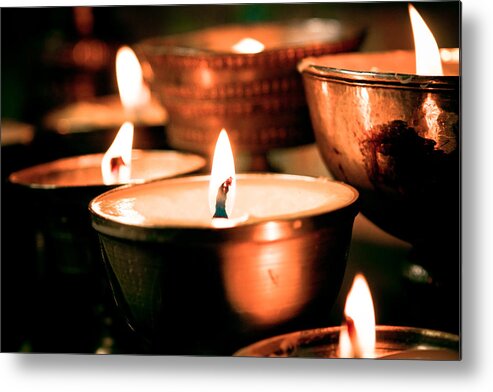 Milarepa Metal Print featuring the photograph candle light ZUTHRUL PHUG MONASTERY Milarepas Cave by Raimond Klavins