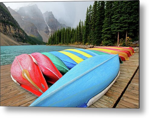 Scenics Metal Print featuring the photograph Canoes Line Dock At Moraine Lake, Banff by Wildroze