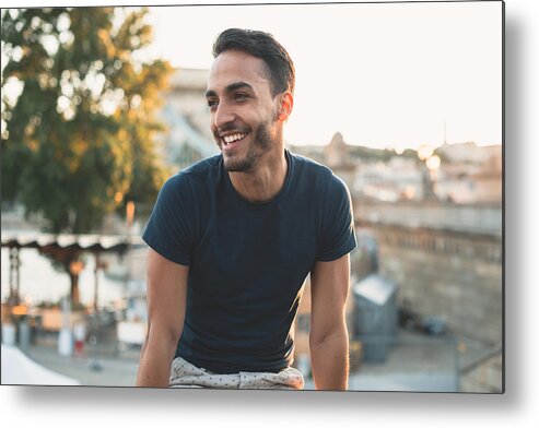 Handsome People Metal Print featuring the photograph Cheerful Latin man traveling around Europe by Drazen_